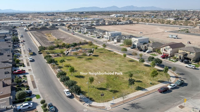bird's eye view with a residential view and a mountain view