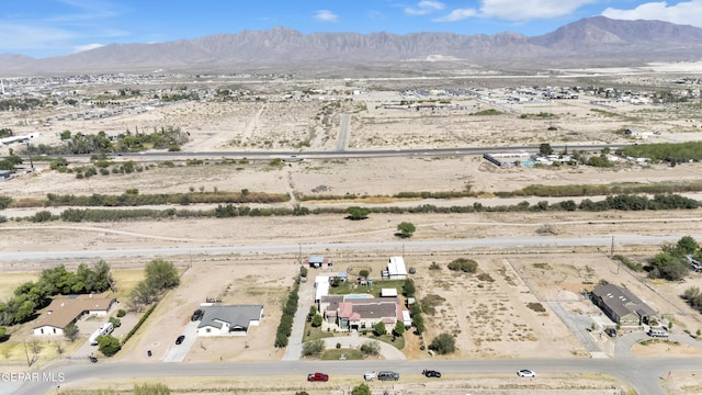 bird's eye view featuring a mountain view and a rural view