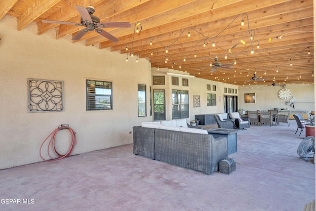view of patio / terrace featuring outdoor dining space, a ceiling fan, and outdoor lounge area