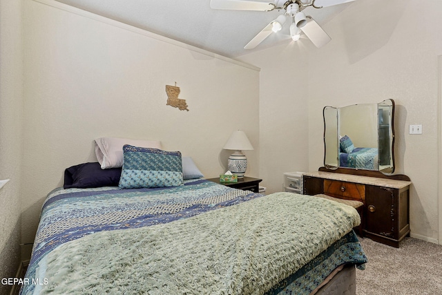 bedroom with baseboards, a ceiling fan, and light colored carpet