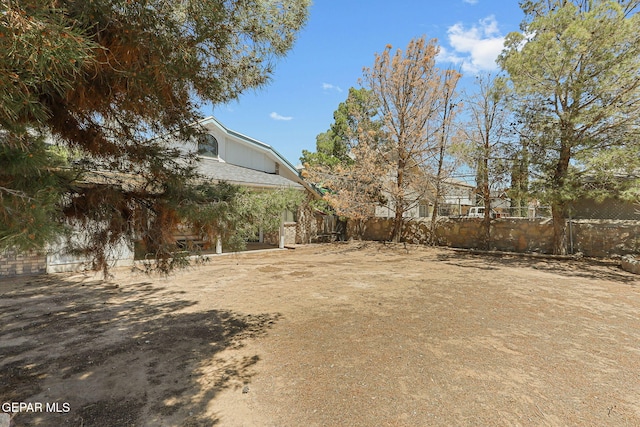 view of yard featuring fence