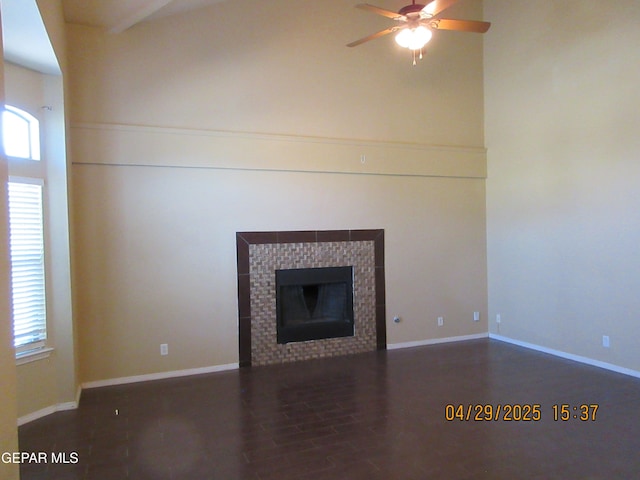 11233 Red Barrel Pl, El Paso, TX 79934 - unfurnished living room with a ceiling fan, baseboards, wood finished floors, and a fireplace
