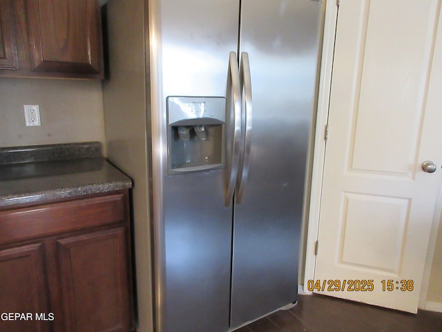 11233 Red Barrel Pl, El Paso, TX 79934 - kitchen with stainless steel refrigerator with ice dispenser and dark countertops