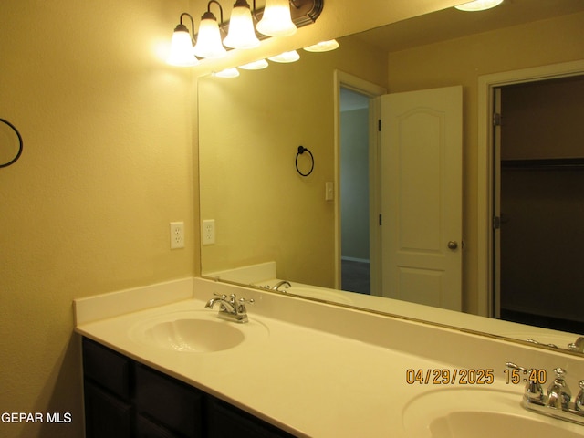 11233 Red Barrel Pl, El Paso, TX 79934 - bathroom featuring a sink and double vanity