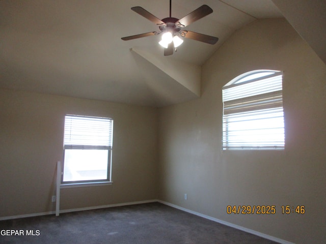 11233 Red Barrel Pl, El Paso, TX 79934 - empty room with dark colored carpet, baseboards, ceiling fan, and vaulted ceiling