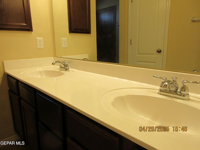 11233 Red Barrel Pl, El Paso, TX 79934 - bathroom featuring a sink and double vanity