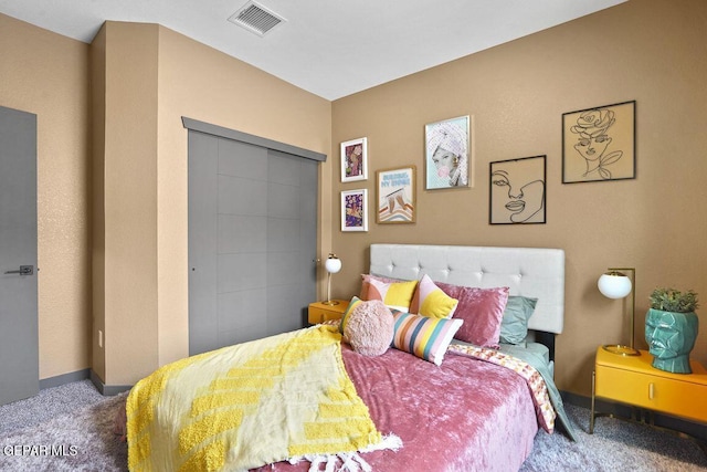 bedroom with carpet and visible vents