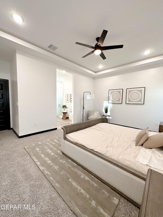 carpeted bedroom featuring baseboards, visible vents, and recessed lighting
