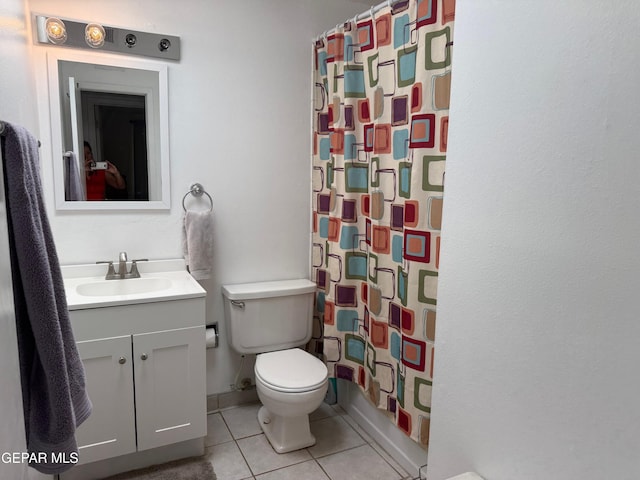 full bathroom featuring a shower with curtain, tile patterned flooring, toilet, and vanity