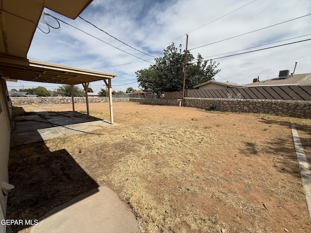fenced backyard featuring a patio