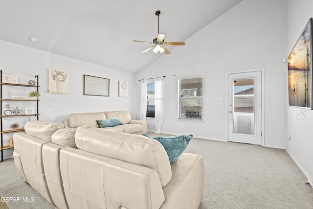 living area with ceiling fan, high vaulted ceiling, light carpet, and baseboards