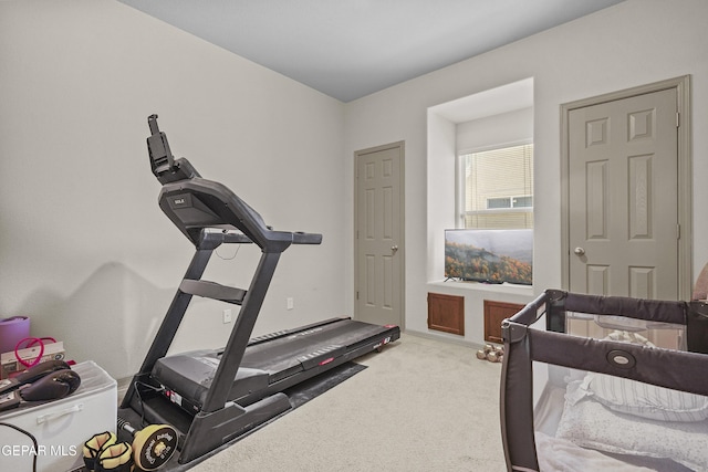 exercise room with carpet floors