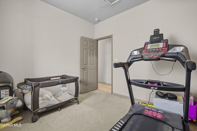 exercise area featuring carpet flooring