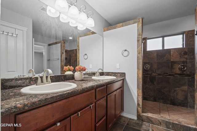 7337 Autumn Sage Dr, El Paso, TX 79911 - bathroom featuring double vanity and a walk in shower