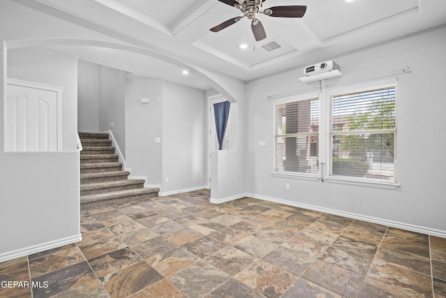 7337 Autumn Sage Dr, El Paso, TX 79911 - empty room with arched walkways, a ceiling fan, coffered ceiling, stairs, and stone finish flooring
