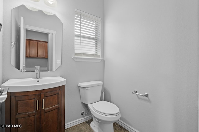 7337 Autumn Sage Dr, El Paso, TX 79911 - half bathroom with toilet and vanity