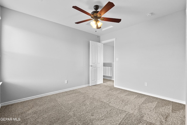 7337 Autumn Sage Dr, El Paso, TX 79911 - empty room featuring carpet, a smoke detector, and a ceiling fan
