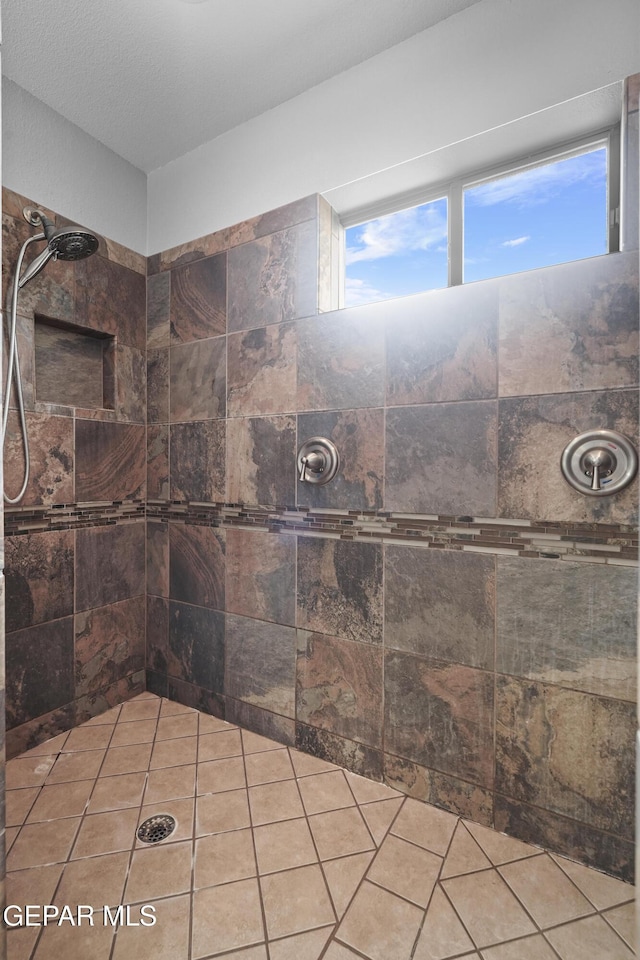 7337 Autumn Sage Dr, El Paso, TX 79911 - bathroom featuring a tile shower