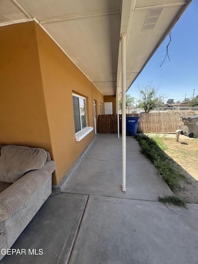 view of patio / terrace with fence