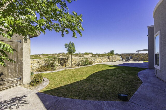 668 Darlington, El Paso, TX 79928 - view of yard featuring a patio and a fenced backyard