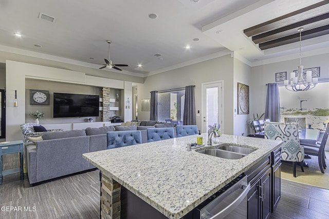 668 Darlington, El Paso, TX 79928 - kitchen with wood finished floors, ceiling fan with notable chandelier, a sink, visible vents, and dishwasher