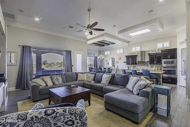 668 Darlington, El Paso, TX 79928 - living room featuring ceiling fan with notable chandelier, wood finished floors, visible vents, recessed lighting, and baseboards