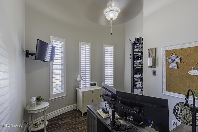 668 Darlington, El Paso, TX 79928 - home office with a ceiling fan, baseboards, and wood tiled floor