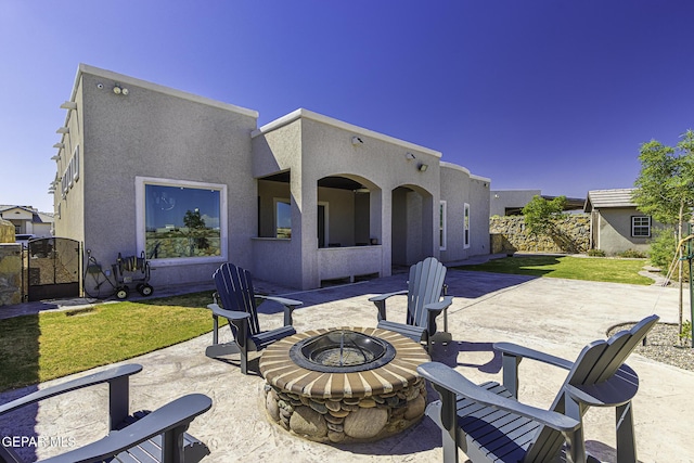668 Darlington, El Paso, TX 79928 - view of patio / terrace featuring a fire pit and a gate