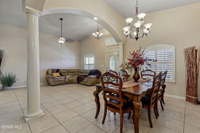 dining space featuring ornate columns, an inviting chandelier, and light tile patterned flooring