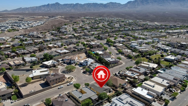 aerial view with a mountain view and a residential view