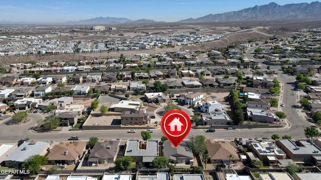 drone / aerial view with a mountain view and a residential view