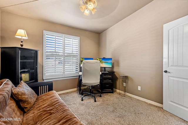 office area featuring ceiling fan, carpet floors, and baseboards