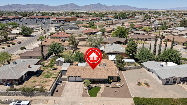 bird's eye view featuring a residential view and a mountain view