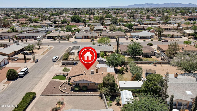 birds eye view of property featuring a residential view and a mountain view