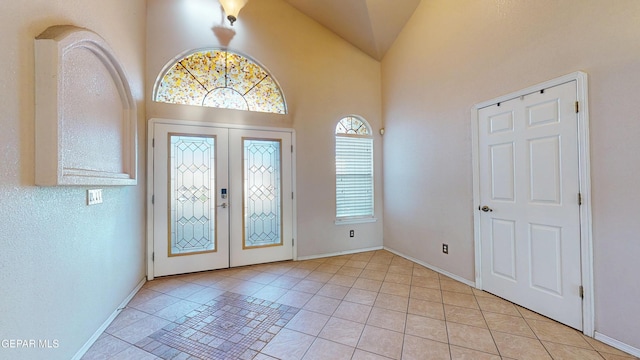 2088 Crystal Ridge St, El Paso, TX 79938 - entrance foyer featuring light tile patterned floors, baseboards, and french doors
