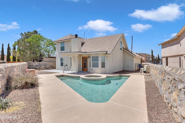 view of swimming pool featuring a fenced backyard, an in ground hot tub, a patio, and a fenced in pool