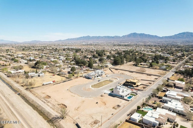drone / aerial view featuring a mountain view