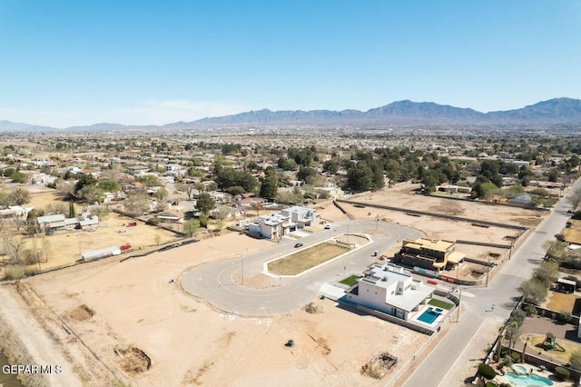 drone / aerial view featuring a mountain view