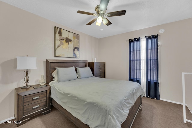 bedroom with carpet, ceiling fan, and baseboards