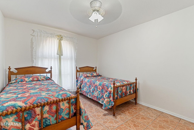 316 Garden Grove Ln, El Paso, TX 79912 - bedroom featuring a ceiling fan and baseboards