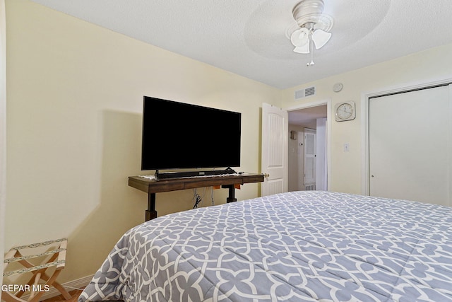 316 Garden Grove Ln, El Paso, TX 79912 - bedroom with a ceiling fan and visible vents