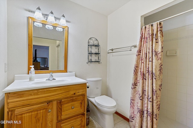 316 Garden Grove Ln, El Paso, TX 79912 - bathroom featuring vanity, toilet, tile patterned flooring, and tiled shower