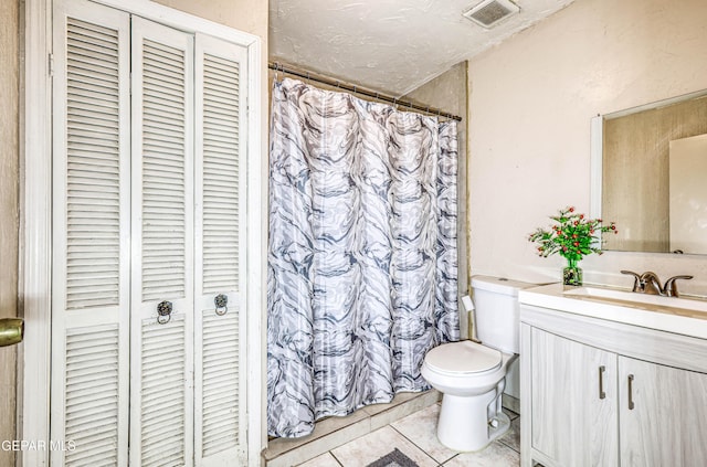 11144 Perlette St, Socorro, TX 79927 - full bathroom with tile patterned flooring, a closet, toilet, vanity, and visible vents