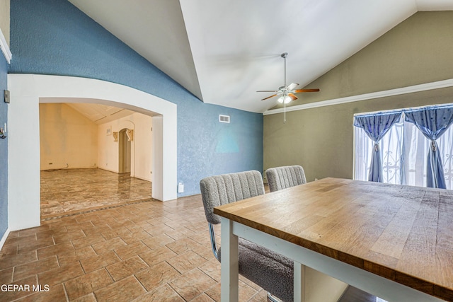 11144 Perlette St, Socorro, TX 79927 - dining room with arched walkways, ceiling fan, and lofted ceiling