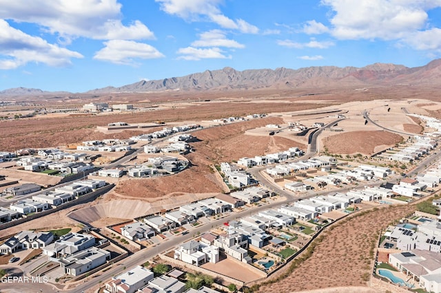 drone / aerial view with a mountain view and a residential view