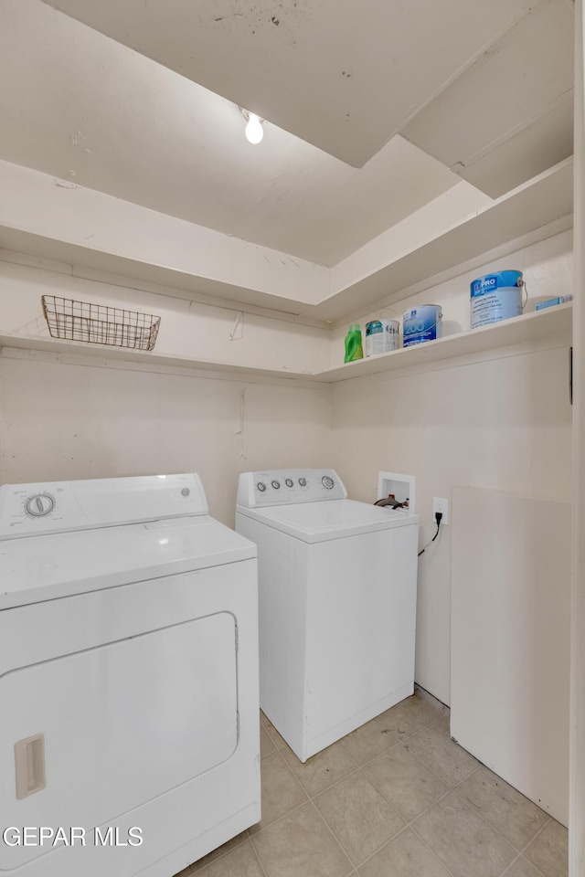1003 Alethea Park Dr, El Paso, TX 79902 - clothes washing area with separate washer and dryer, laundry area, and light tile patterned flooring