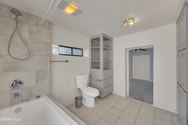 1003 Alethea Park Dr, El Paso, TX 79902 - full bath with toilet, a textured ceiling, shower / bathing tub combination, and tile patterned flooring