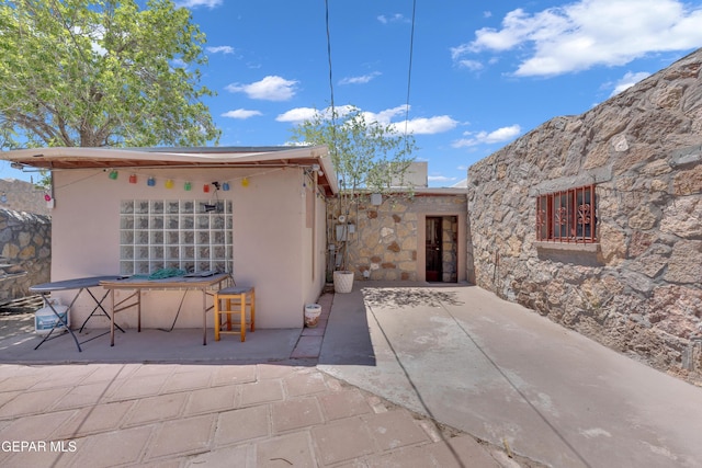 1003 Alethea Park Dr, El Paso, TX 79902 - rear view of property featuring a patio area and stucco siding