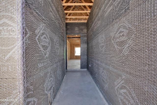 hallway featuring concrete floors