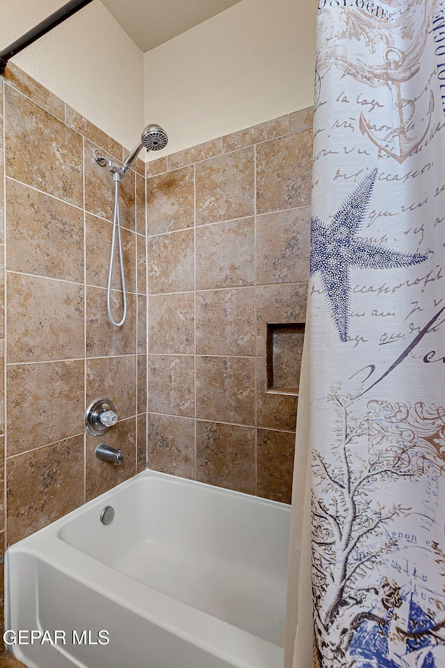 full bathroom with shower / tub combo with curtain